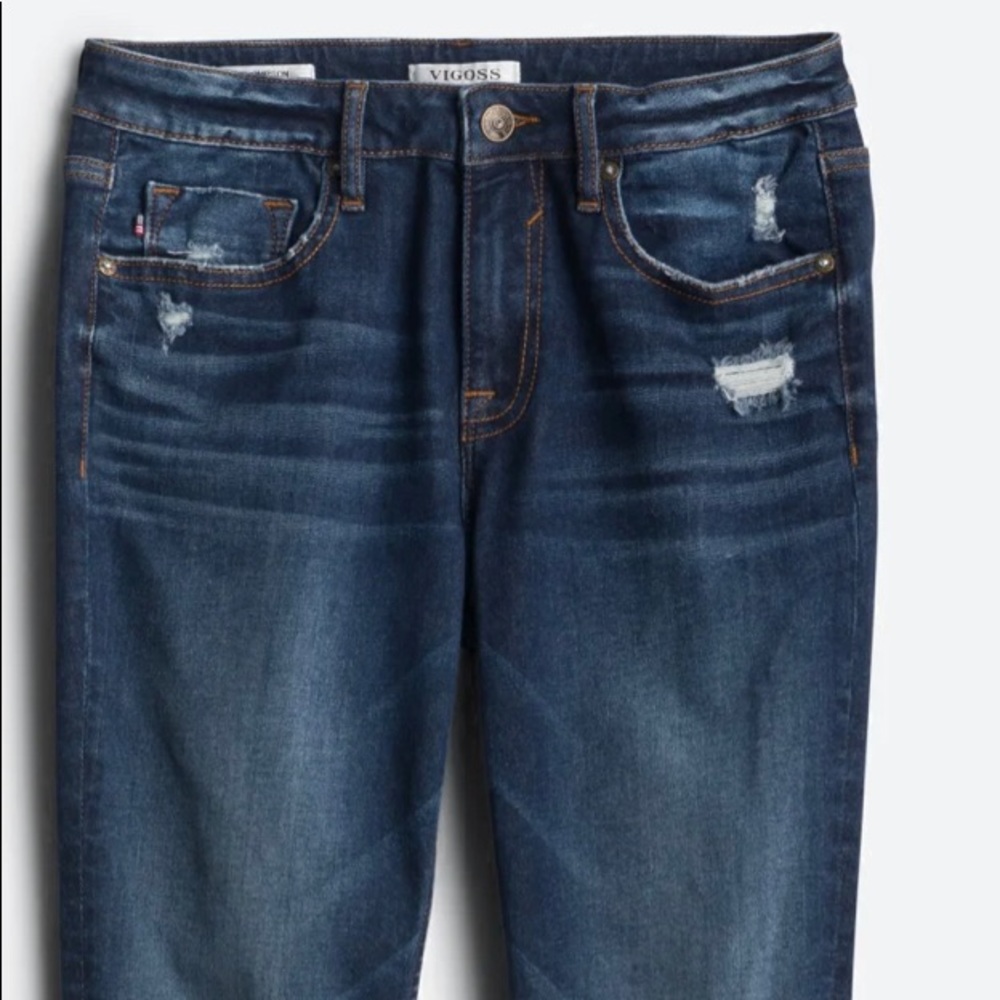 Distressed mid rise jeans